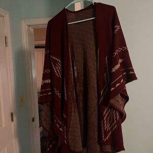 Red and white poncho cardigan.